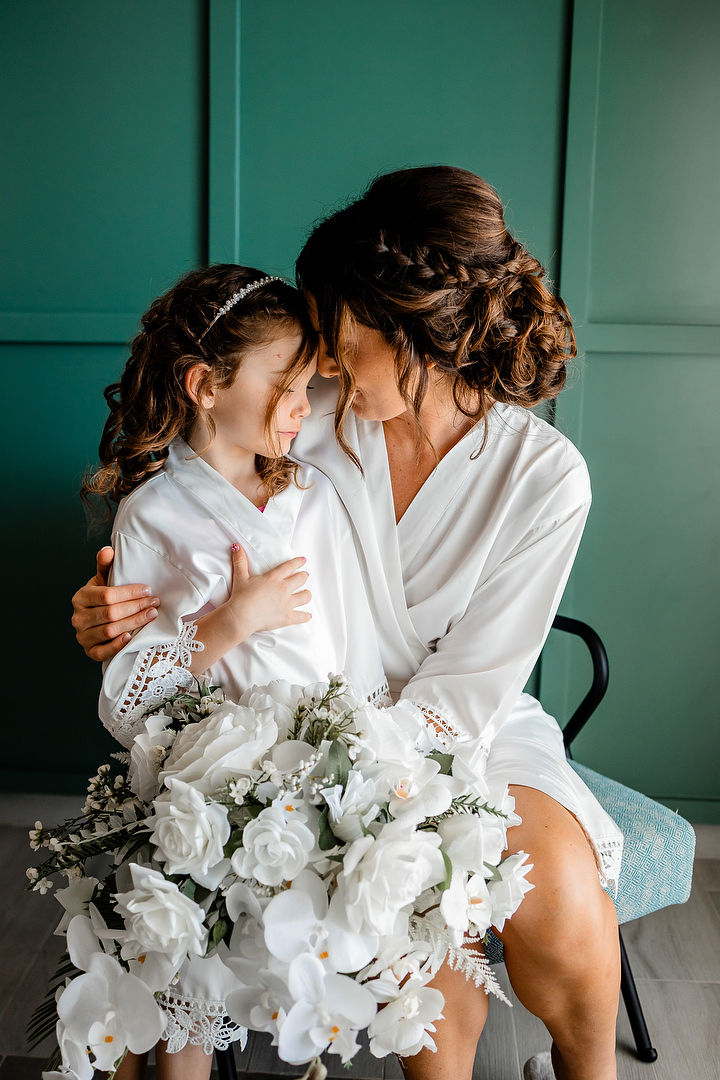 Bride and daughter in robes getting ready for wedding in Ocho Rios Jamaica